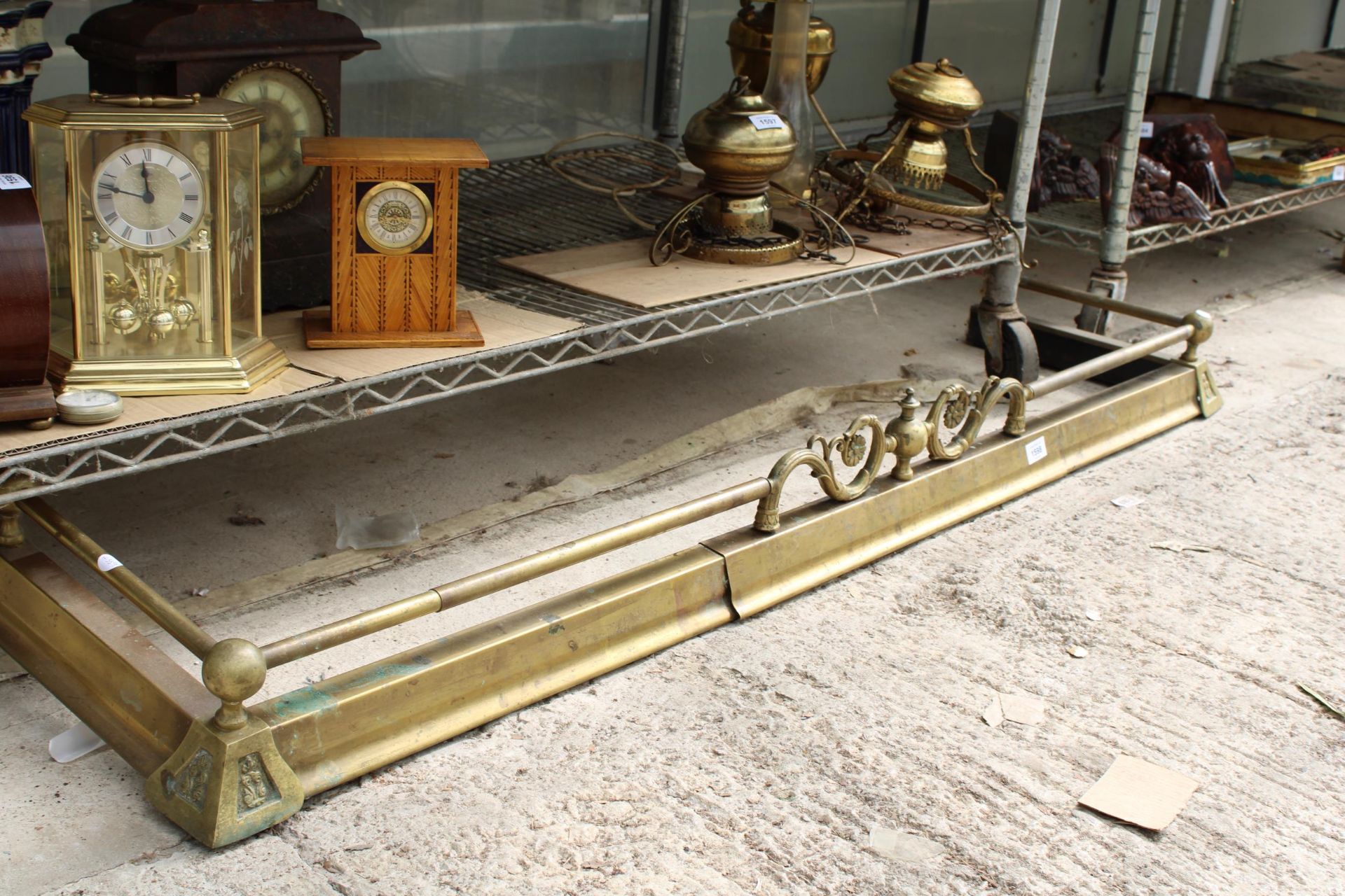 A DECORATIVE BRASS EXTENDABLE FIRE FENDER - Image 2 of 2