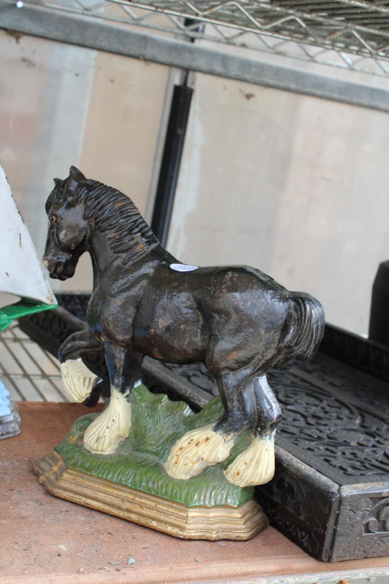 TWO CAST IRON DOOR STOPS, ONE IN THE FORM OF A SHIRE HORSE AND THE OTHER A BOAT - Image 3 of 3