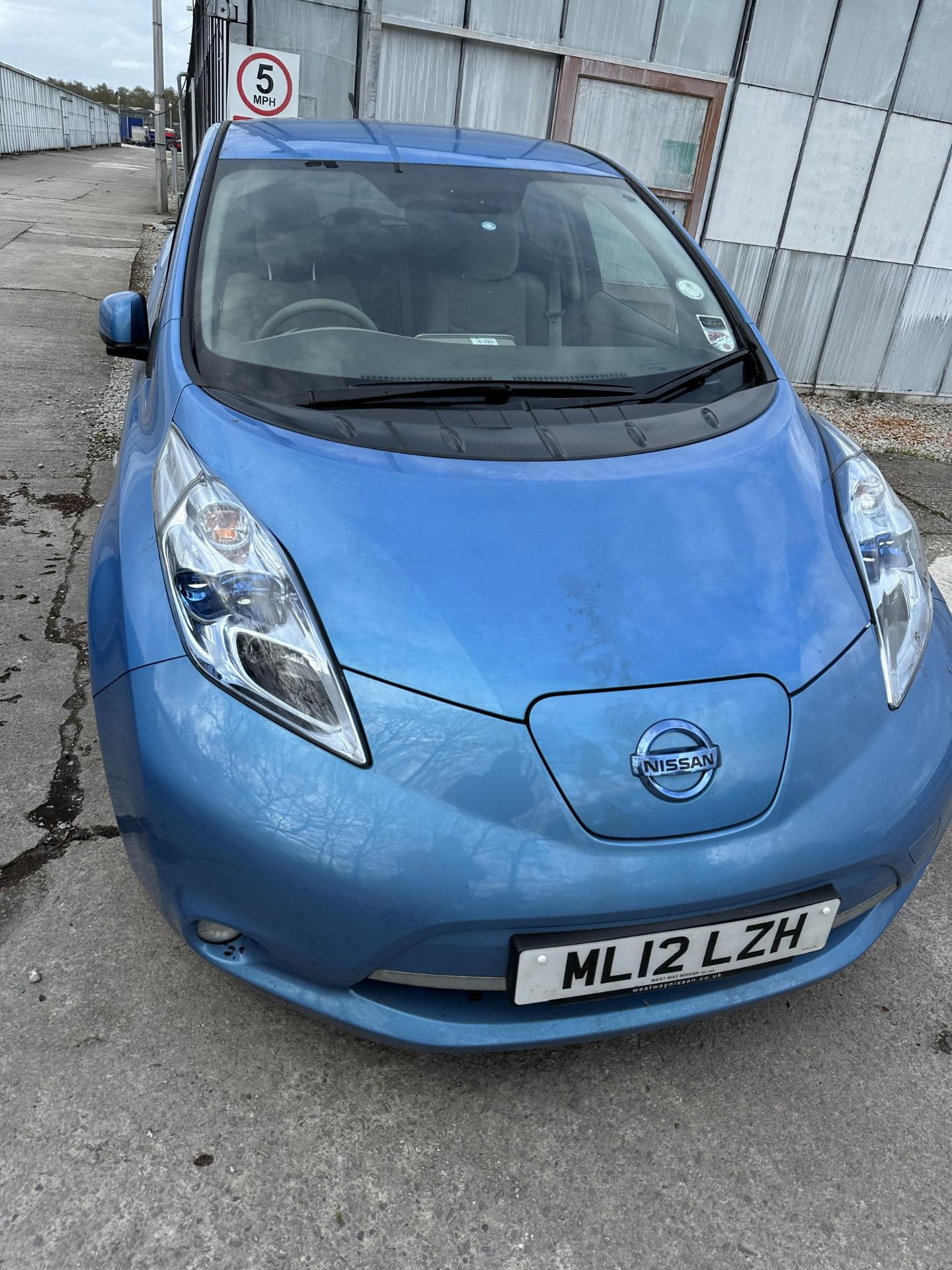 A 2012 NISSAN LEAF ELECTRIC CAR WITH CHARGER, REGISTRATION ML12 LZH. NO KEY, NO V5C, BELIEVED TO - Image 6 of 13