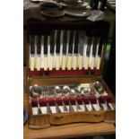 A PRIESTLEY AND MOORE, SHEFFIELD VINTAGE CANTEEN OF CUTLERY IN AN OAK ART DECO STYLE CASE