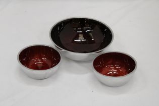 THREE MATCHING DESIGNER ENAMELLED BOWLS