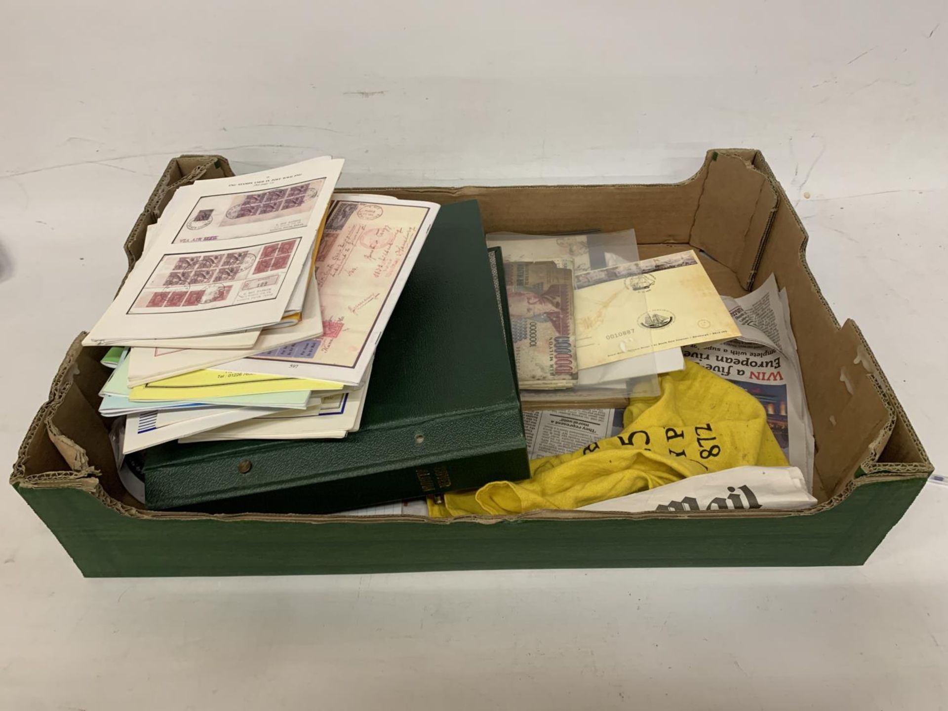 A LARGE BOXED ASSORTMENT OF STAMPS