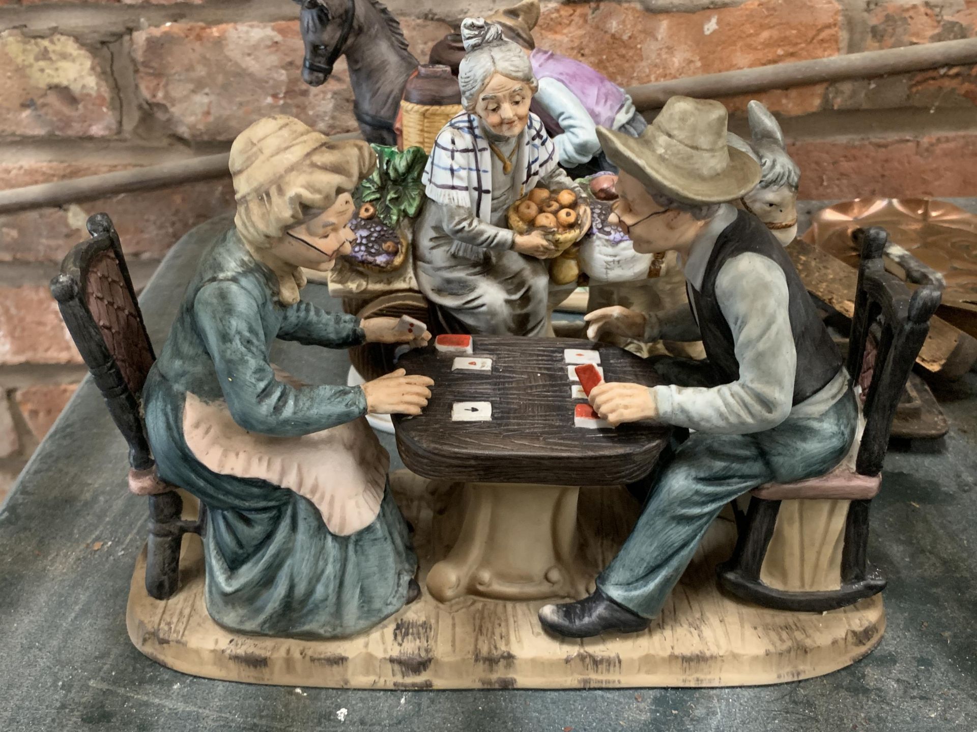 SIX CHALKWARE FIGURINES FEATURING A COUPLE PLAYING CARD GAMES, LADY WITH DONKEY AND CART ETC - Image 3 of 4