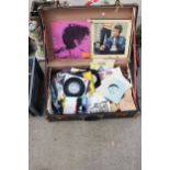 A SUITCASE WITH AN ASSORTMENT OF LP RECORDS AND 7" SINGLES