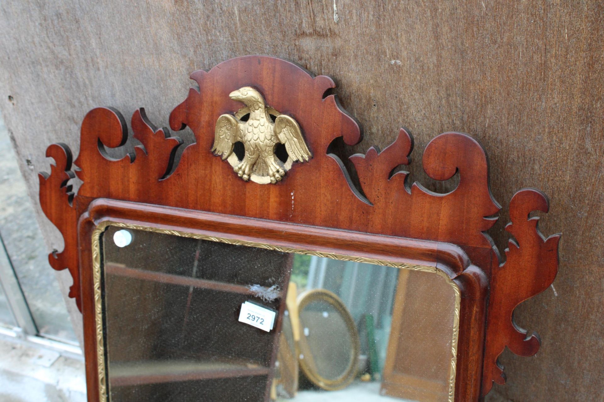 A 19TH CENTURY STYLE MAHOGANY WALL MIRROR WITH GOLD COLOURED EAGLE CARVING 41" X 24" - Image 2 of 4