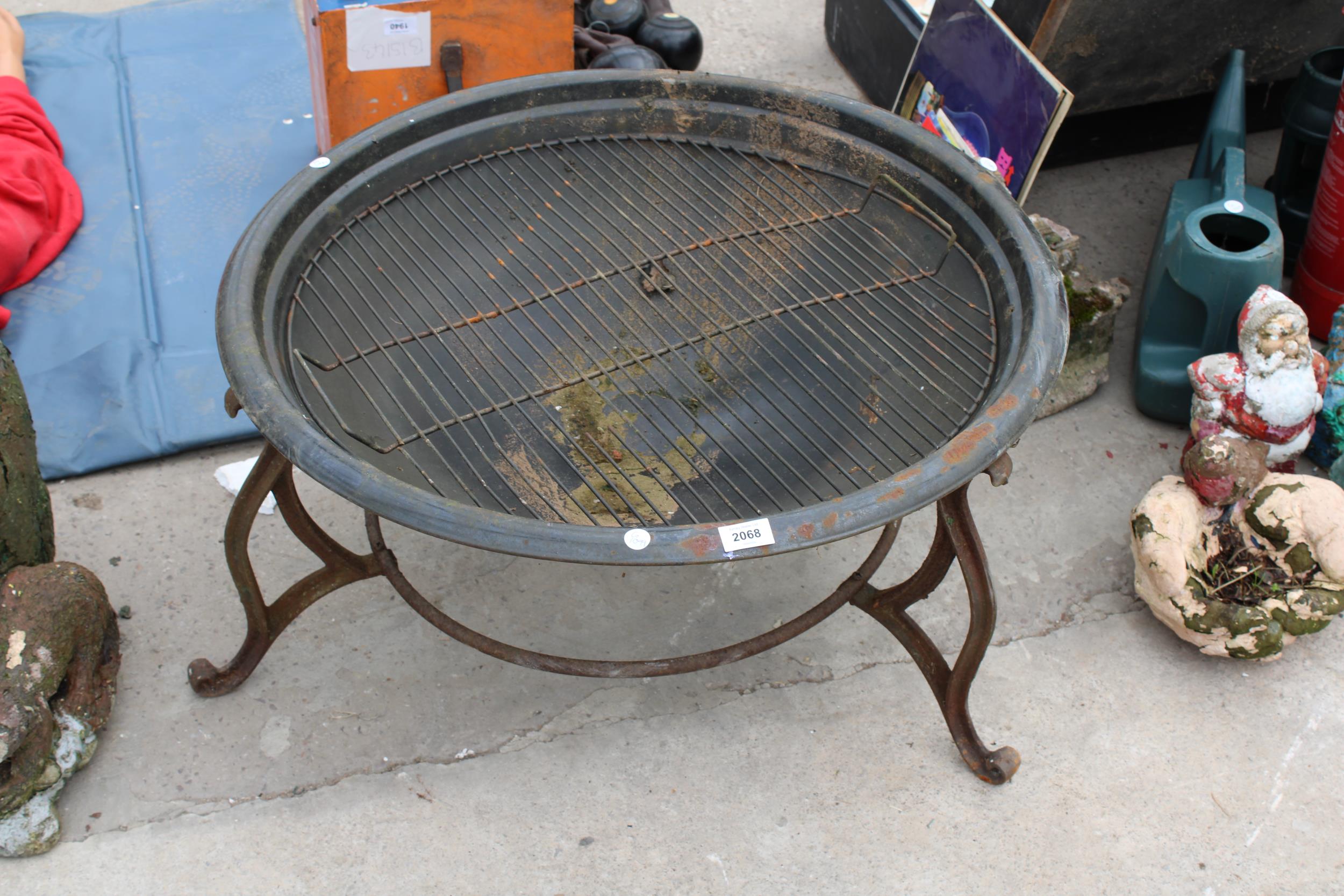 A CIRCUALR METAL FIRE PIT