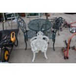 A METAL BISTRO TABLE AND TWO CHAIRS AND A FURTHER CAST ALLOY BISTRO CHAIR