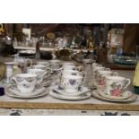 A LARGE QUANTITY OF VINTAGE CHINA TRIOS TO INCLUDE EDWARDIAN POTTERY, A , HALLMARKED SILVER TOPPED