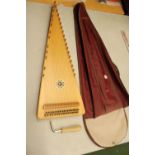 A HOPF PSALTERY WITH TUNING KEY AND STORAGE BAG