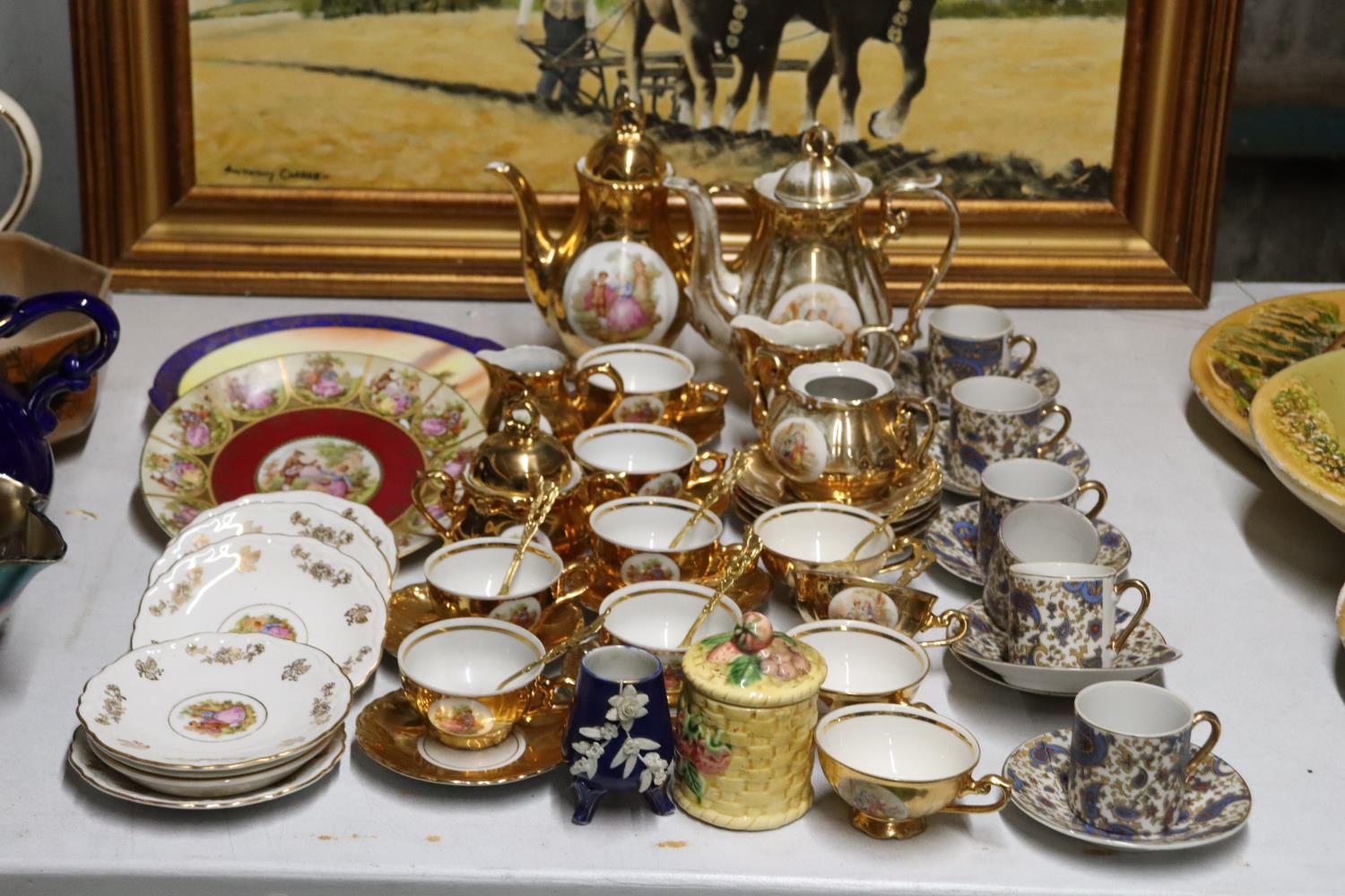 A QUANTITY OF VINTAGE TEAWARE TO INCLUDE GERMAN GILT WITH A CLASSICAL DESIGN, COFFEE POTS, SUGAR