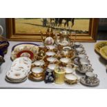 A QUANTITY OF VINTAGE TEAWARE TO INCLUDE GERMAN GILT WITH A CLASSICAL DESIGN, COFFEE POTS, SUGAR