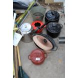 AN ASSORTMENT OF VARIOUS METAL COOKING POTS