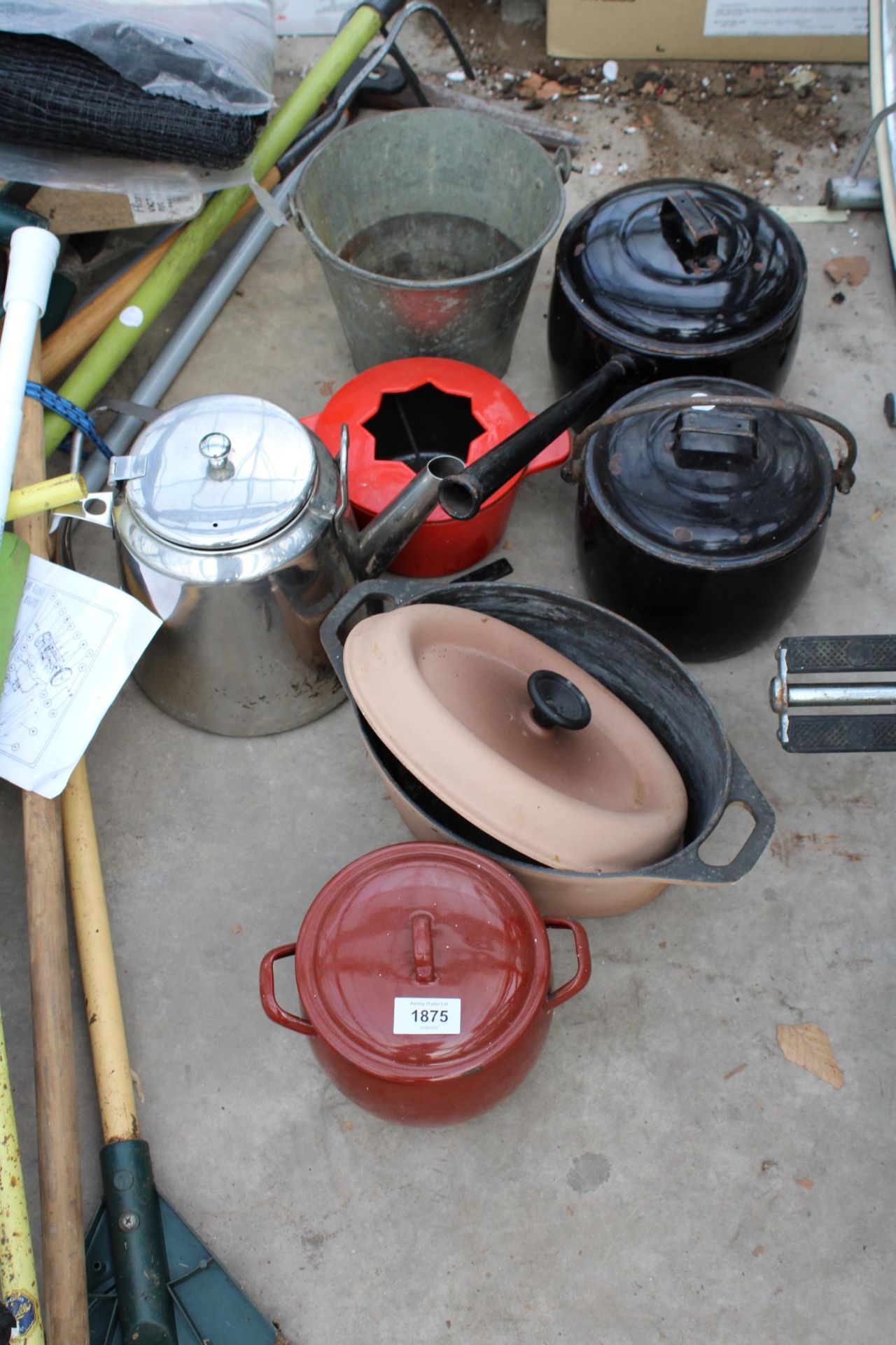 AN ASSORTMENT OF VARIOUS METAL COOKING POTS