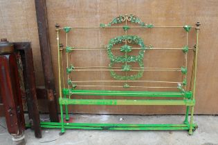 A BRASS AND IRON 4'6" BEDSTEAD DECORATED WITH LEAVES