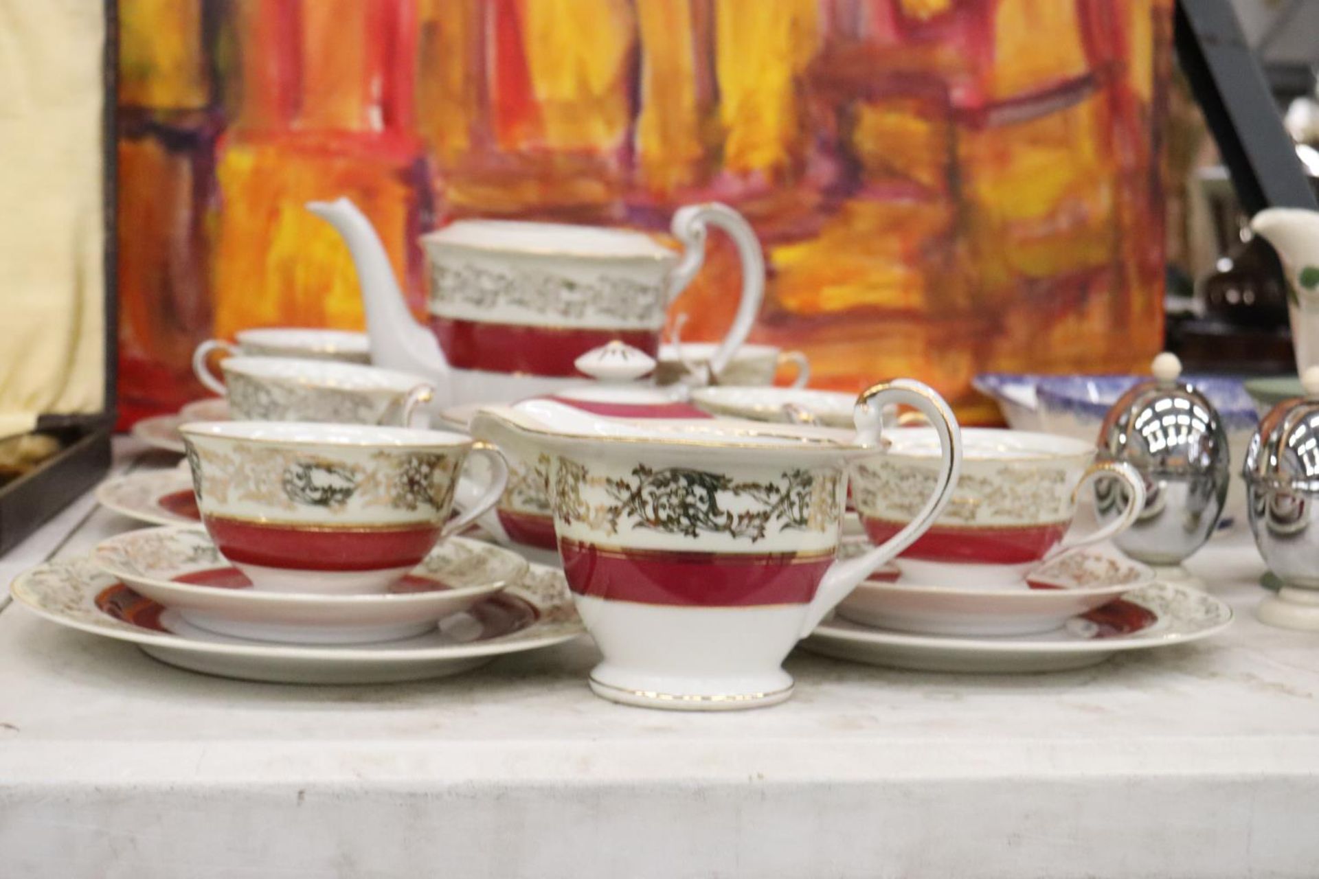 A 'TOKYO CHINA' TEASET TO INCLUDE A TEAPOT (NO LID), CREAM JUG, SUGAR BOWL, CUPS, SAUCERS AND SIDE