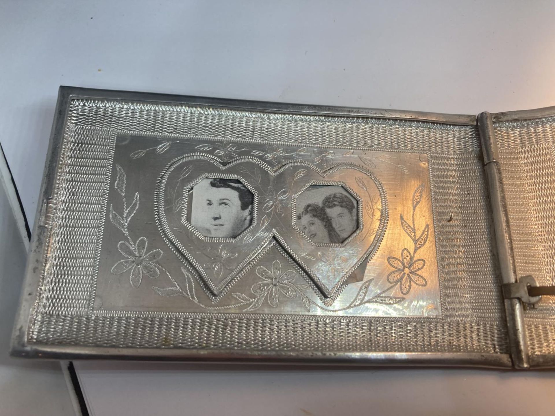 AN UNUSUAL WHITE METAL AND ENAMEL CIGARETTE CASE DEPICTING INDIA, EGYPT AND AFRICA WITH HEART SHAPED - Image 4 of 5