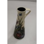 A MOORCROFT POTTERY JUG - SIGNED - 18.5 CM