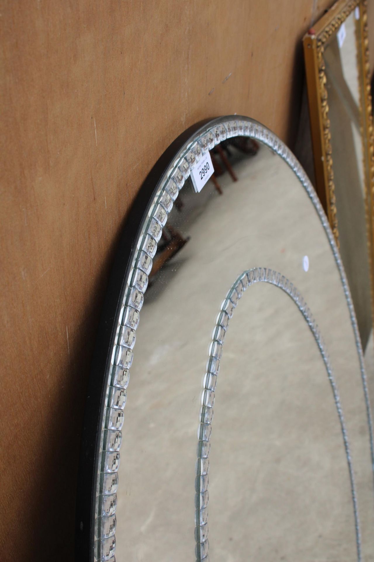 A MODERN OVAL MIRROR WITH TWO ROWS OF DIAMOND EFFECT DECORATIONS, 47" X 32" - Image 3 of 3