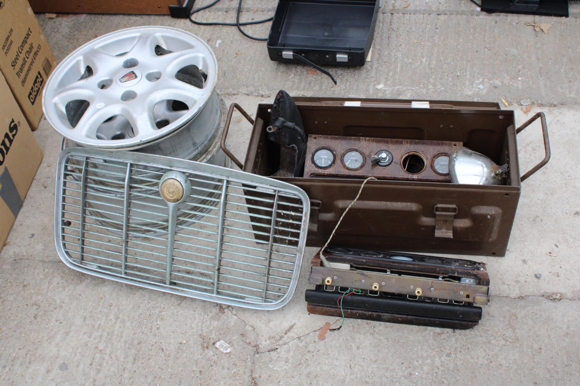 A PAIR OF ROVER ALLOY WHEELS, A VINTAGE JAGUAR RADIATOR GRILL, LUCAS LAMP AND CAR INSTRUMENTS