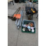 AN ASSORTMENT OF GARDEN TOOLS TO INCLUDE A WHEEL BARROW, A WASHING LINE AND BRUSHES ETC