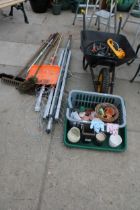 AN ASSORTMENT OF GARDEN TOOLS TO INCLUDE A WHEEL BARROW, A WASHING LINE AND BRUSHES ETC