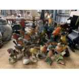 A LARGE LOT OF BIRD RELATED FIGURES TO INCLUDE BESWICK ETC (SOME A/F)