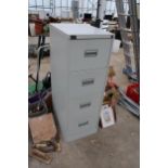 A FOUR DRAWER METAL FILING CABINET