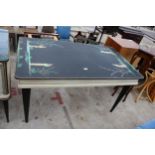 A 1960'S ITALIAN DINING TABLE ON BLACK TAPERING LEGS, THE TOP FEATURING CHINOISERIE DECORATION IN