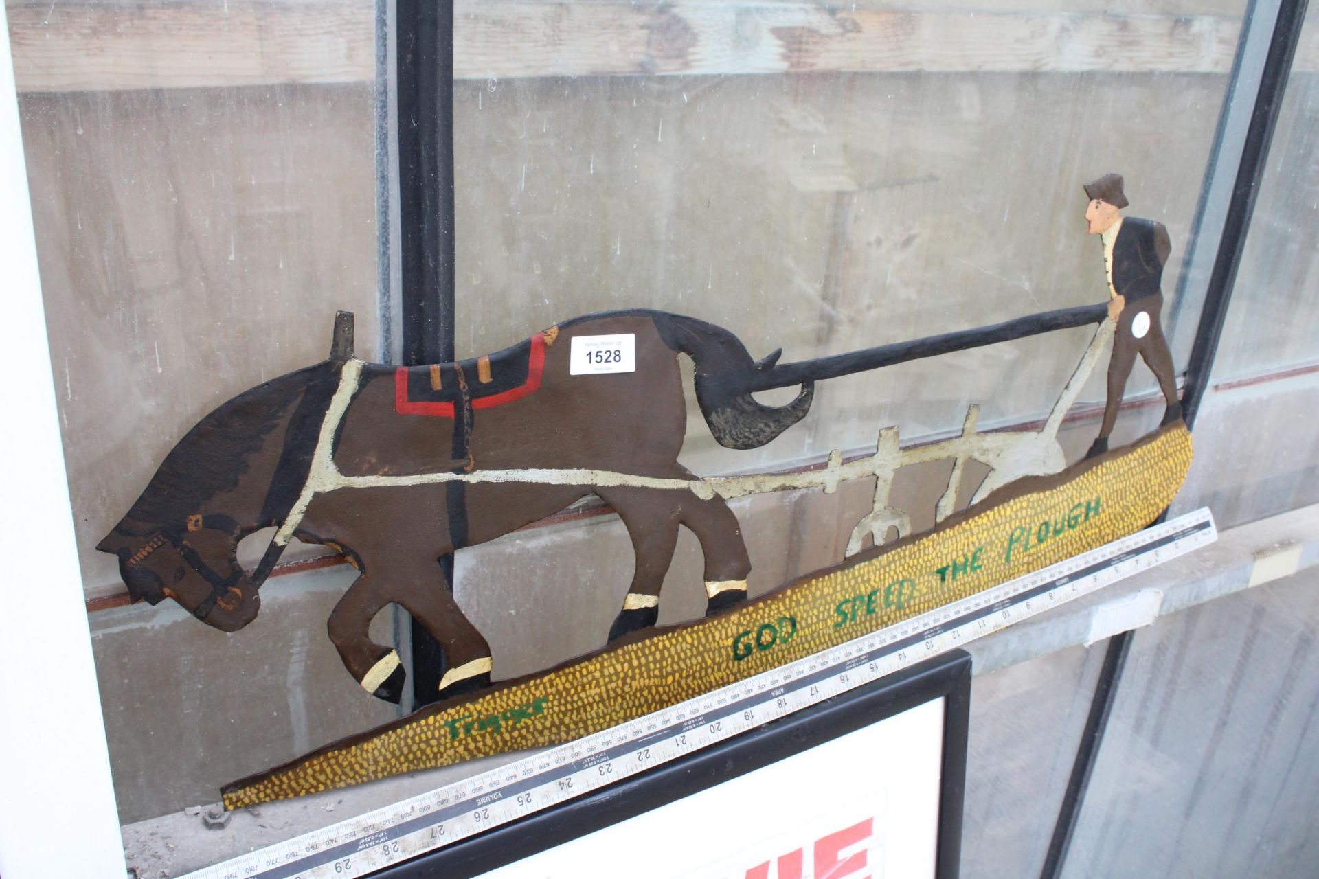 A TIN PLAQUE OF A MAN PLOUGHING WITH A HORSE - Image 2 of 2