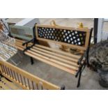 A WOODEN SLATTED GARDEN BENCH WITH CAST BENCH ENDS AND METAL LATTICE BACK