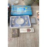 AN ASSORTMENT OF ITEMS TO INCLUDE WINE GLASSES AND A STAINLESS STEEL SERVING SET