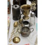 A HEAVY BRASS FOOTED BOWL, PEWTER COFFEE POT, SUGAR BOWL AND JUG, SUGAR SIFTER AND THREE BRASS