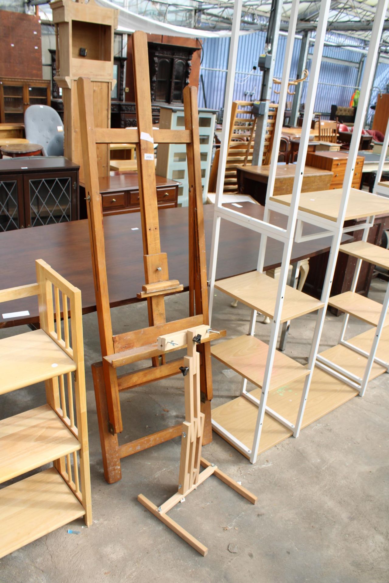 TWO MODERN EASELS