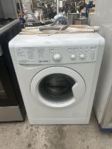 AN INDESIT AUTOMATIC WASHING MACHINE (IWC.71252)