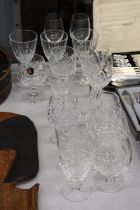 A QUANTITY OF MAINLY CUT GLASS GLASSES, TO INCLUDE BRANDY BALLOONS, WINE, ETC