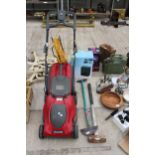 AN ELECTRIC MOUNTFIELD LAWN MOWER, A SLEDGE HAMMER AND A HALF MOON