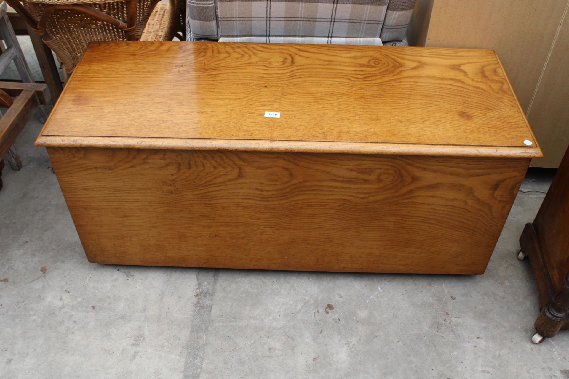 A MID 20TH CENTURY OAK BLANKET CHEST 48" WIDE