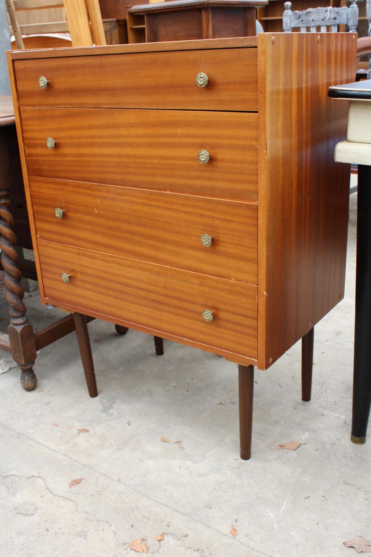 A RETRO TEAK CHEST OF FOUR DRAWERS ON TAPERING LEGS WITH BRASS HANDLES 25" WIDE - Image 3 of 3