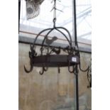 A VINTAGE AND DECORATIVE PAN HANGING RACK DEPICTING CHICKENS