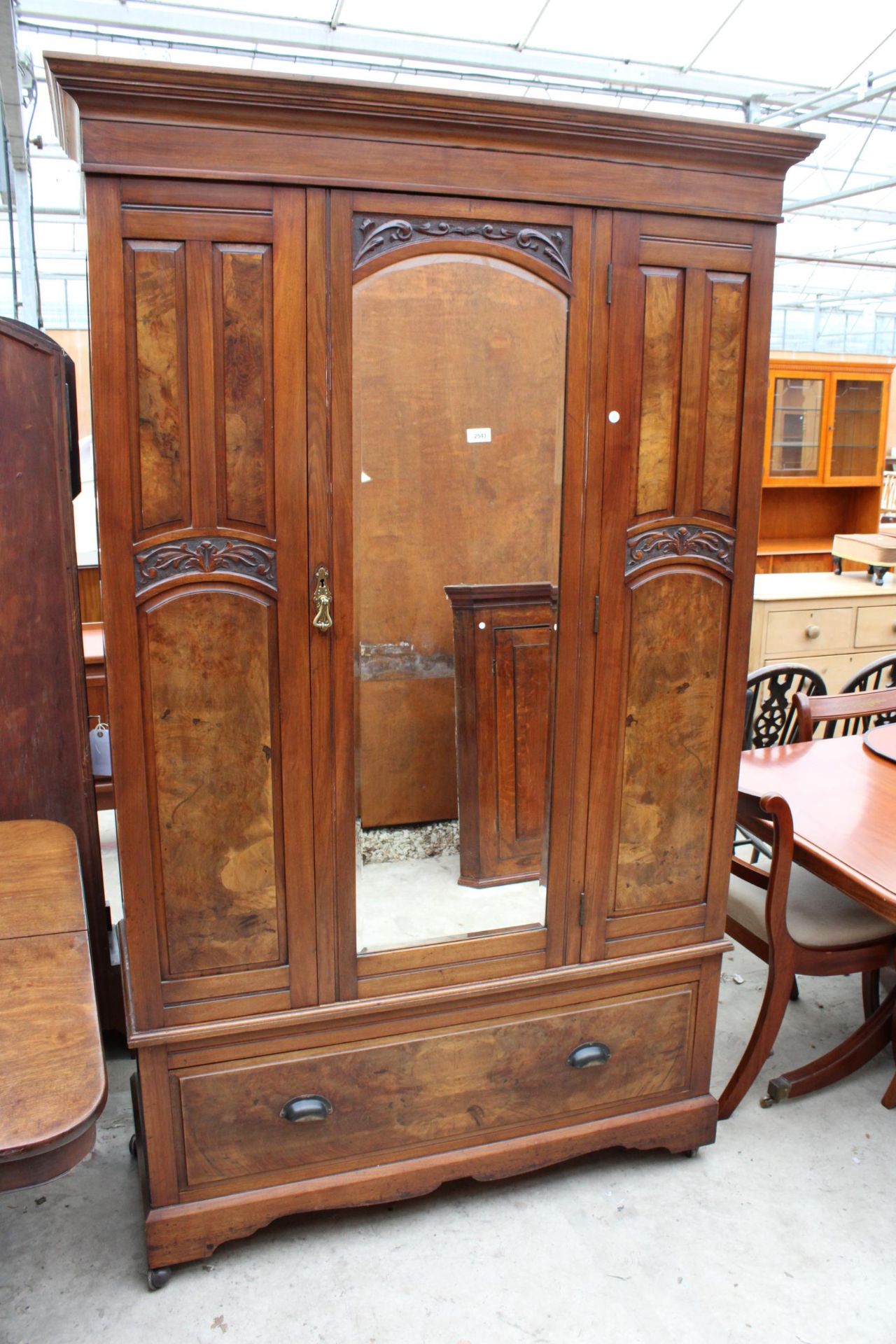 A LATE VICTORIAN WALNET MIRROR DOOR WARDROBE WITH DRAWER TO BASE 50" WIDE