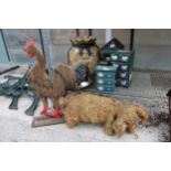 AN ASSORTMENT OF DECORATIVE ITEMS TO INCLUDE A PLASTIC POTATO SACK, A CAST IRON CHICKEN