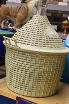 A VINTAGE FIVE GALLON DEMIJOHN AND BASKET