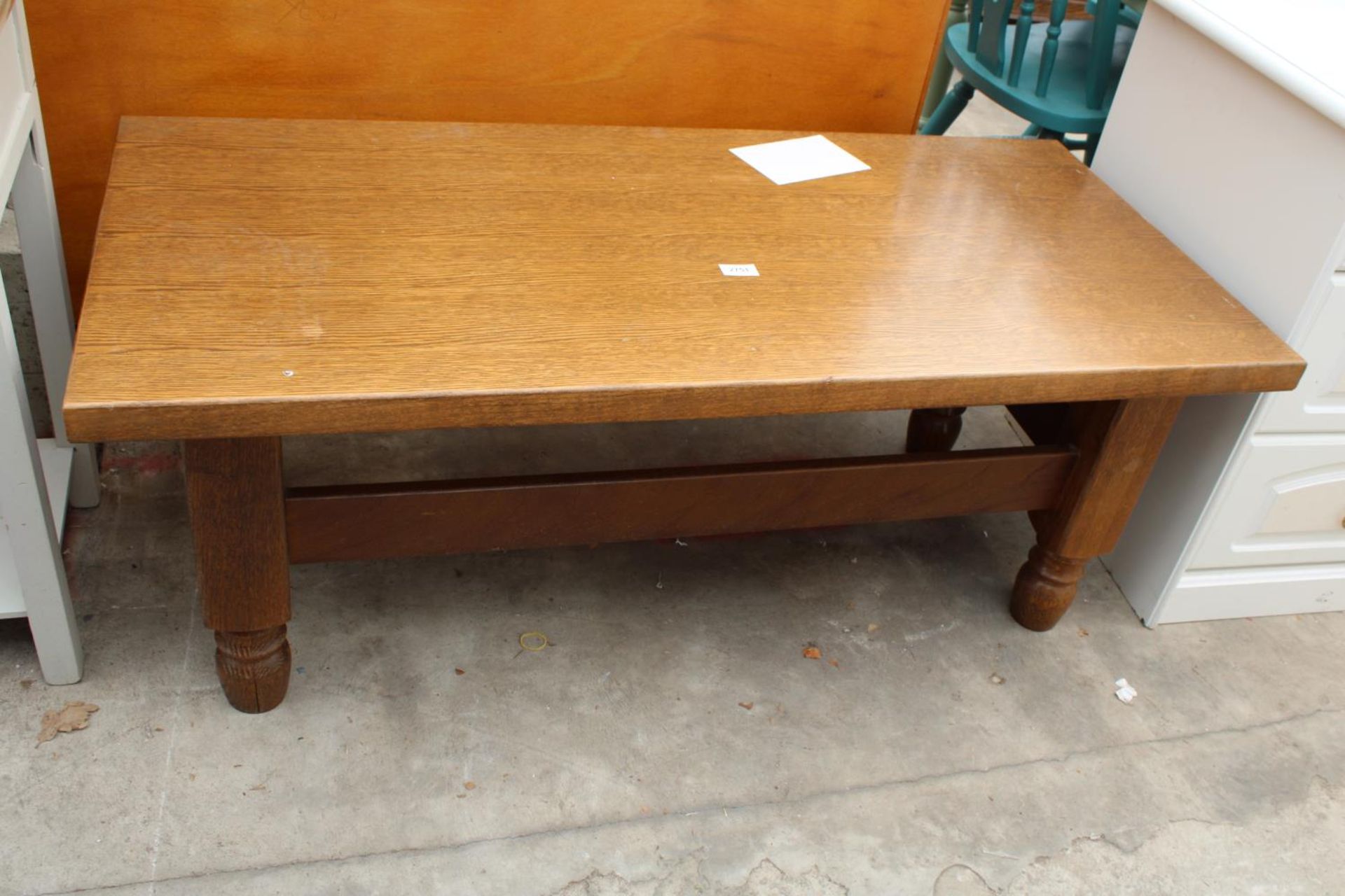 A MODERN OAK COFFEE TABLE, 47" X 22"