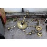 AN ASSORTMENT OF BRASS LIGHT FITTINGS AND SHADES