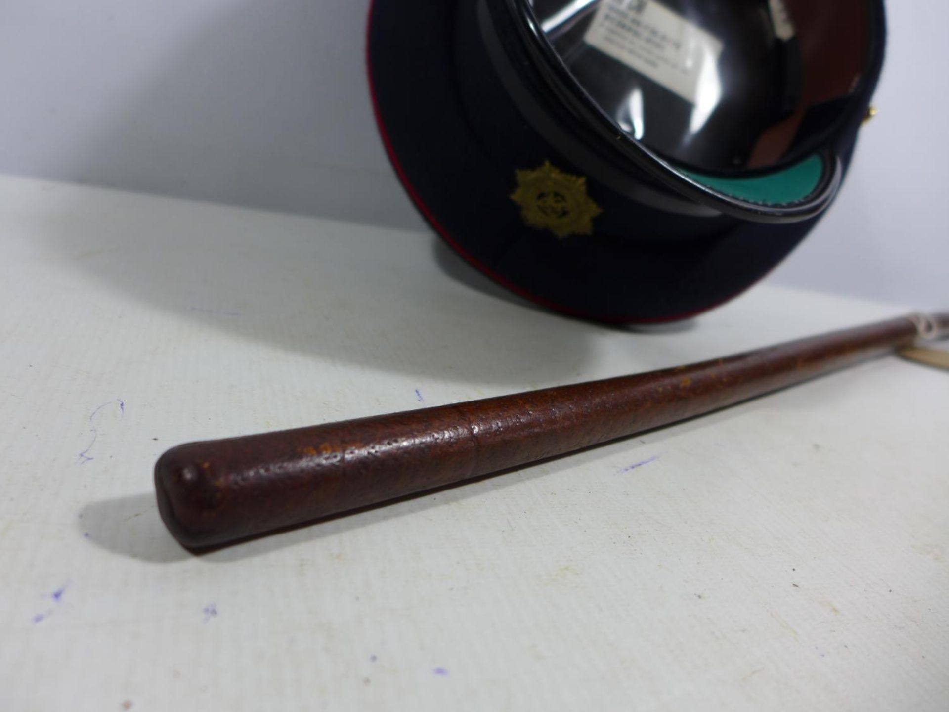 A ROYAL ARMY SERVICE CORP CAP SIZE 58 AND A LEATHER SWAGGER STICK - Image 4 of 4