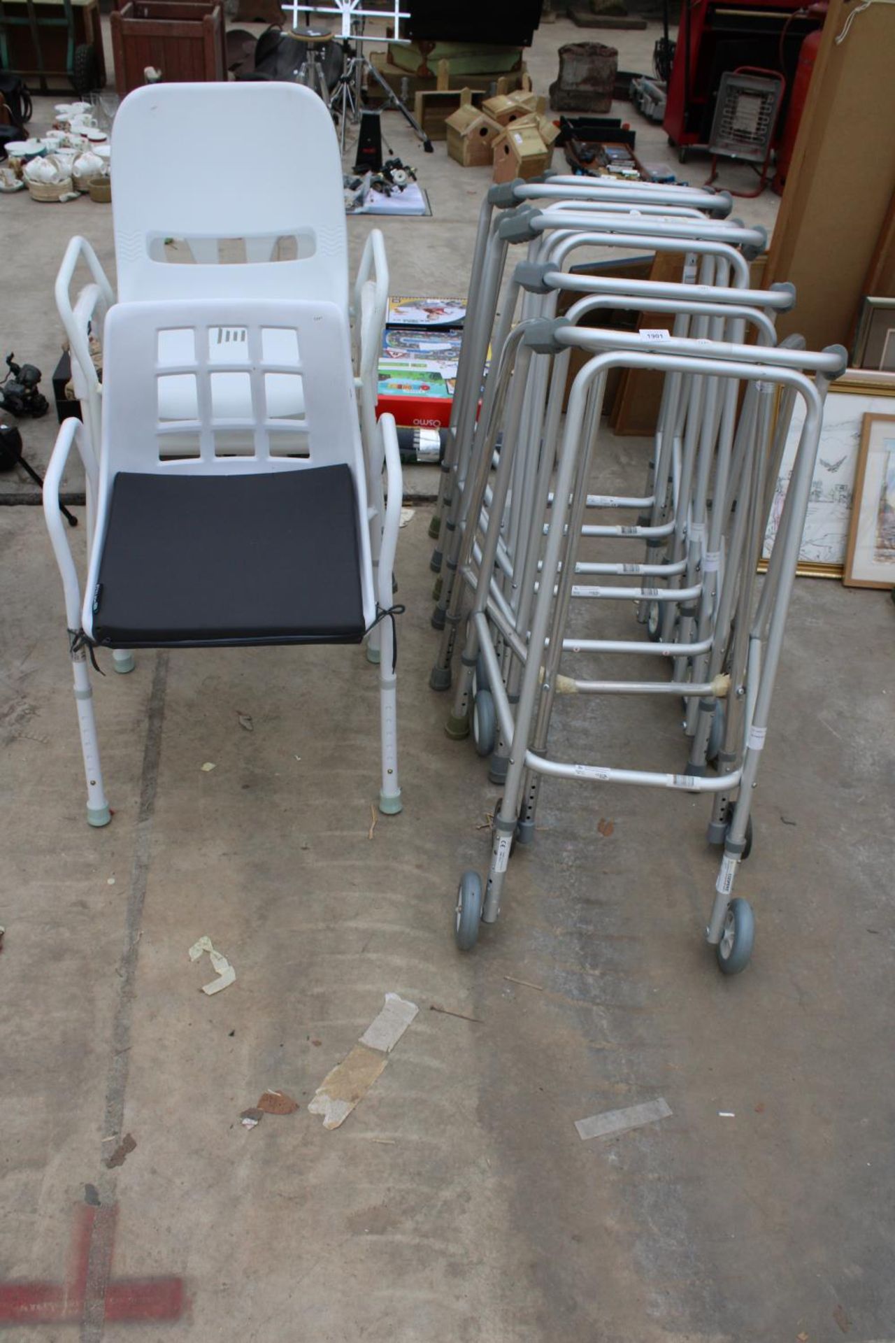 SEVEN ZIMMER FRAMES AND THREE SHOWER SEATS