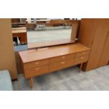 A RETRO SCHREIBER DRESSING TABLE ENCLOSING 6 DRAWERS, 60" WIDE