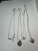 FOUR SILVER NECKLACES WITH PENDANTS