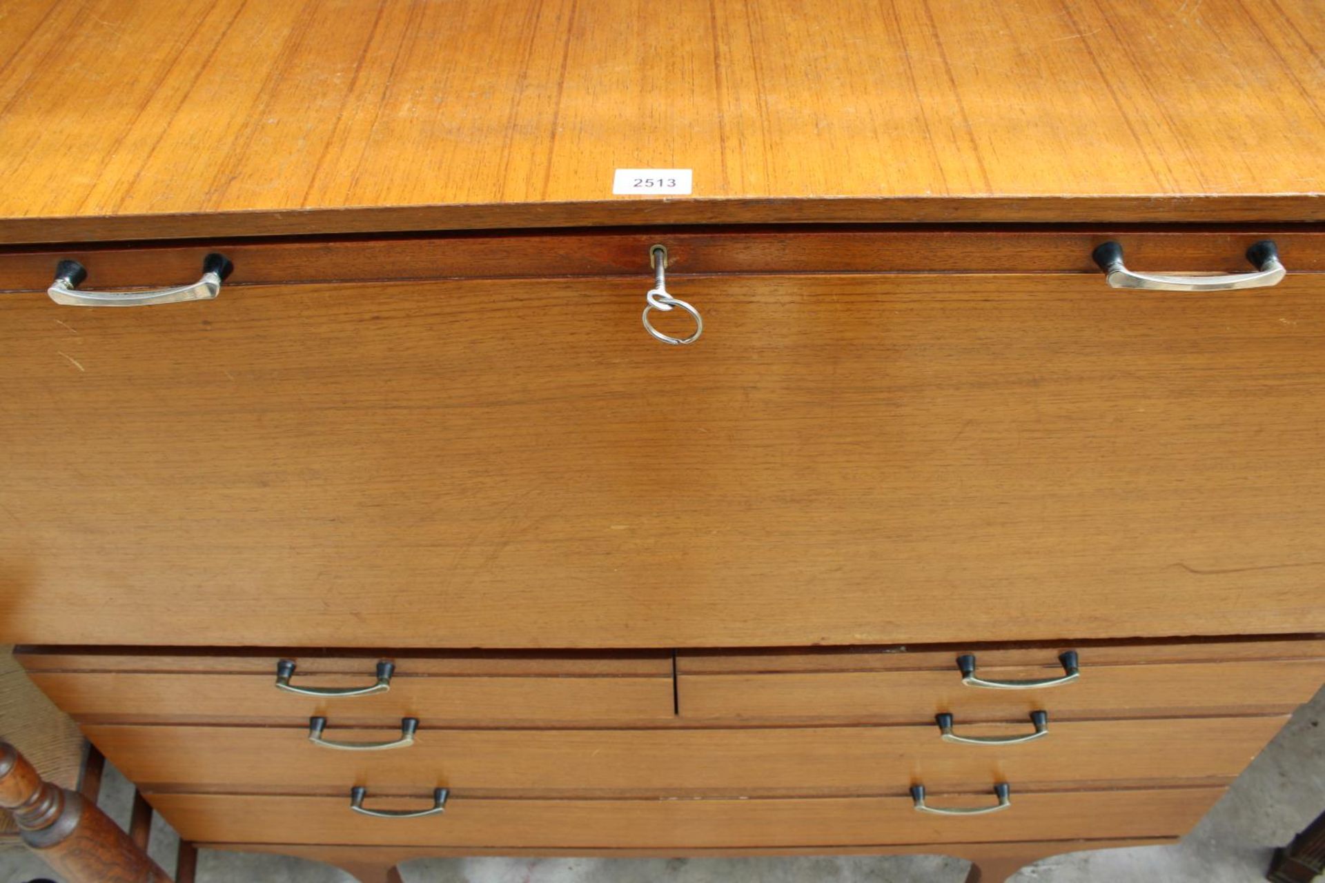 A RETRO TEAK BUREAU WITH DROP-DOWN FLAP, 2 SHORT AND 2 LONG DRAWERS TO BASE - Image 4 of 4