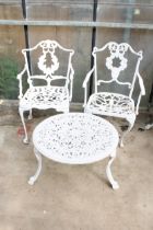 A CAST ALLOY FURNITURE SET COMPRISING OF A ROUND COFFEE TABLE AND TWO CARVER CHAIRS